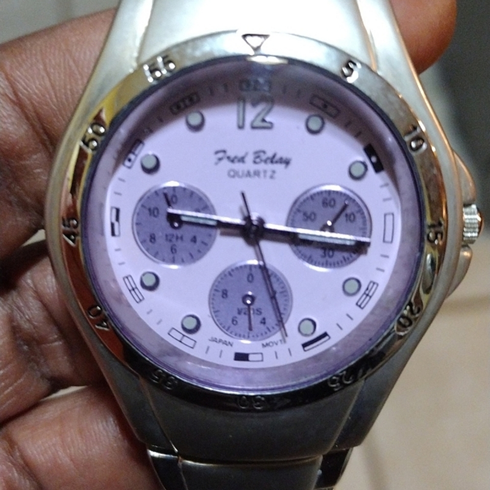 New Men's Fred Belay watch .Purple face,needs batteries.